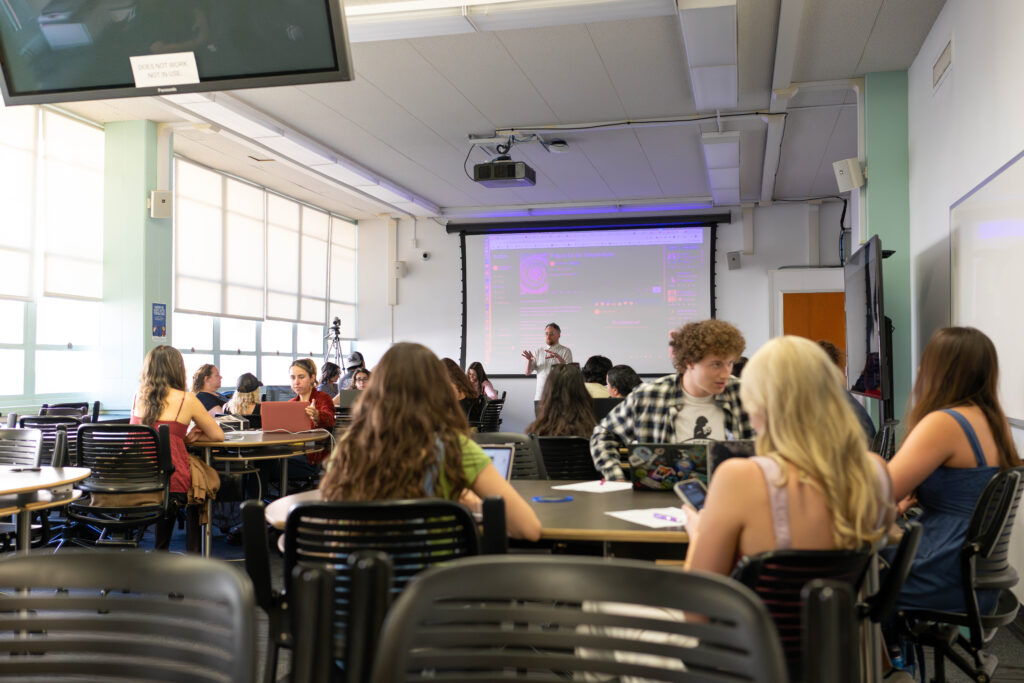 View of classroom from the back looking forward towards the professor