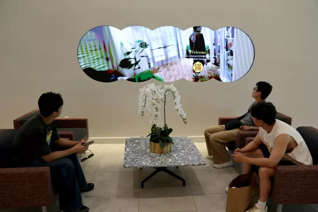 Students watch a video in USC Viterbi’s Dr. Allen and Charlotte Ginsburg Human-Centered Computation Hall.
(Allen J. Schaben/Los Angeles Times)